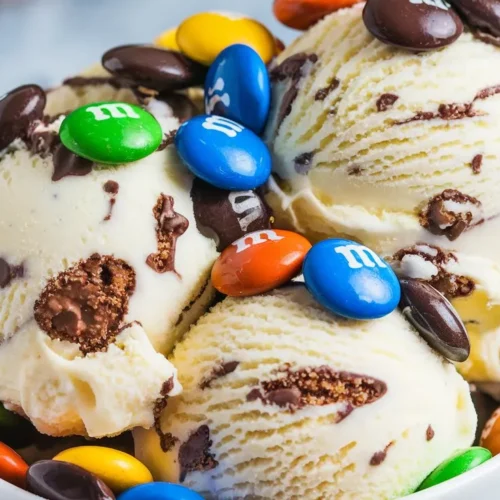 a bowl of rich creamy m m ice cream fres 8S1MKx7yTmCmm7bwf kxPA 0bjRQ9KjShi2nof7N0YrUg